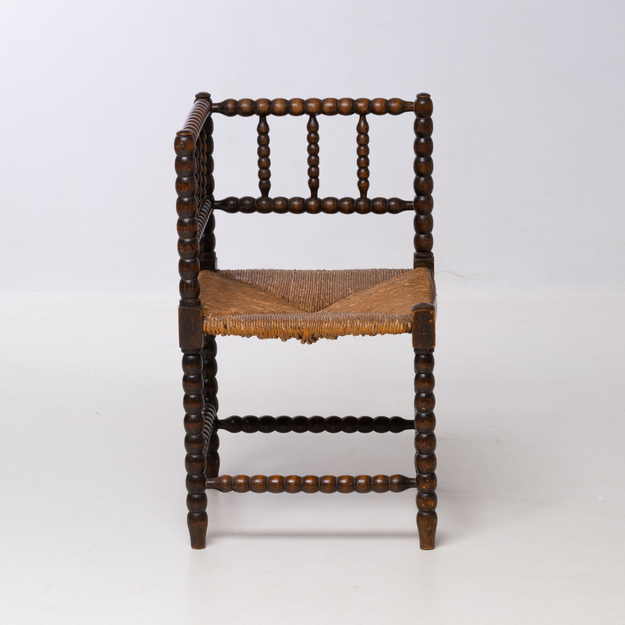 BRUTALIST OAK AND WICKER CORNER CHAIR, 1970S, DUTCH DESIGN