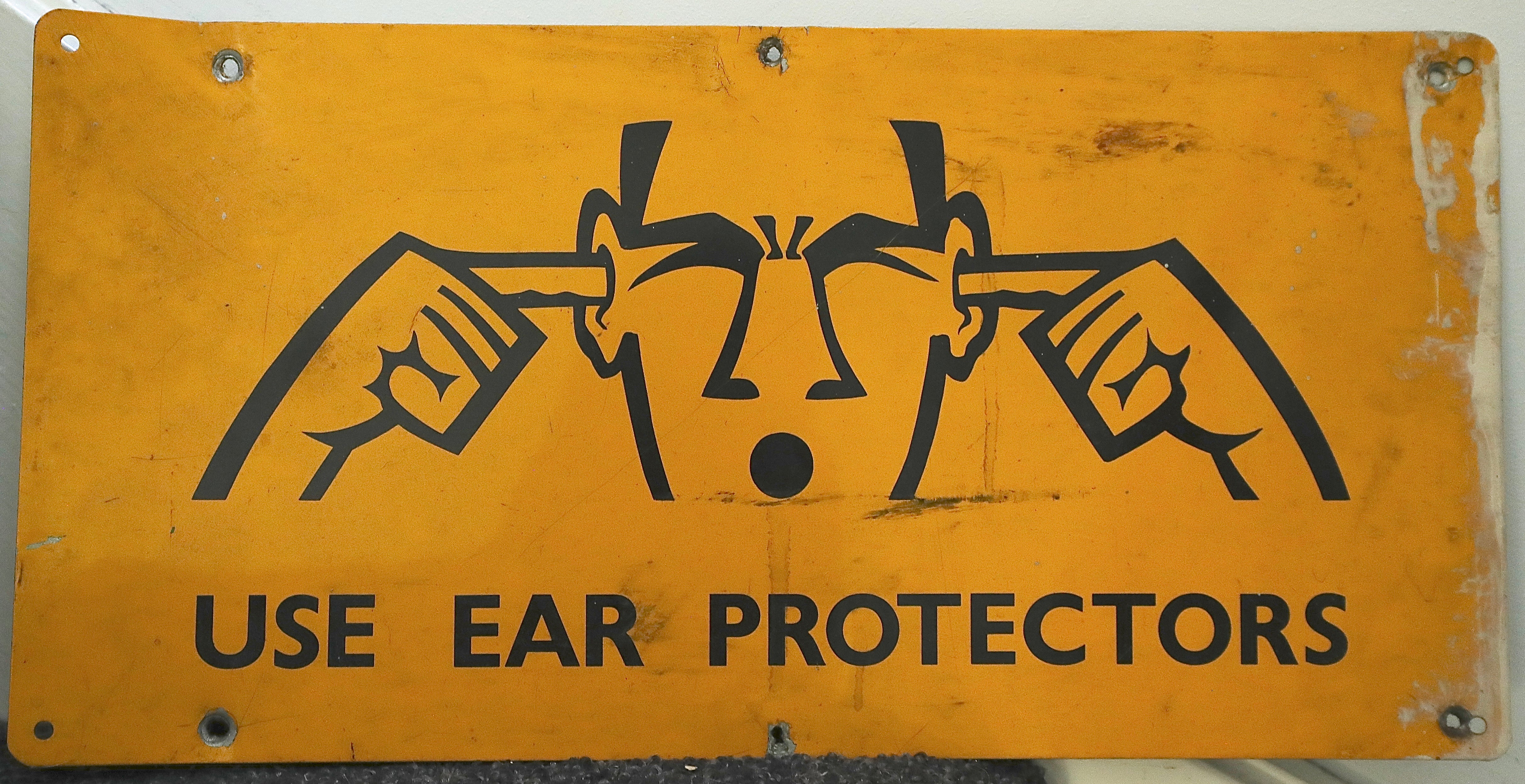 USE EAR PROTECTORS, SIGN, WWII